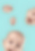 Happy baby heads floating on a light blue background