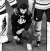 black and white photo of Matt Dumba down on one knee for the anthem